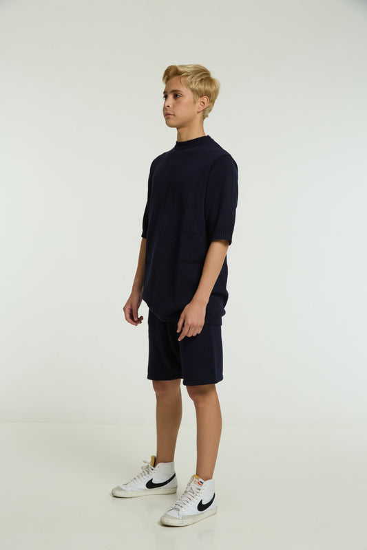 Kids navy cord set, front view, boy wearing sneakers