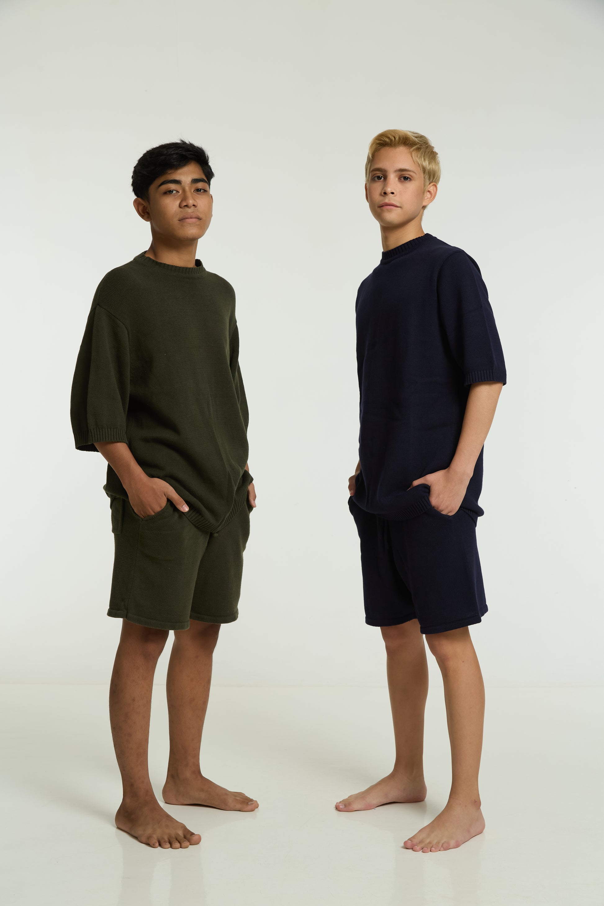 Kids cord sets in navy and olive, worn side by side
