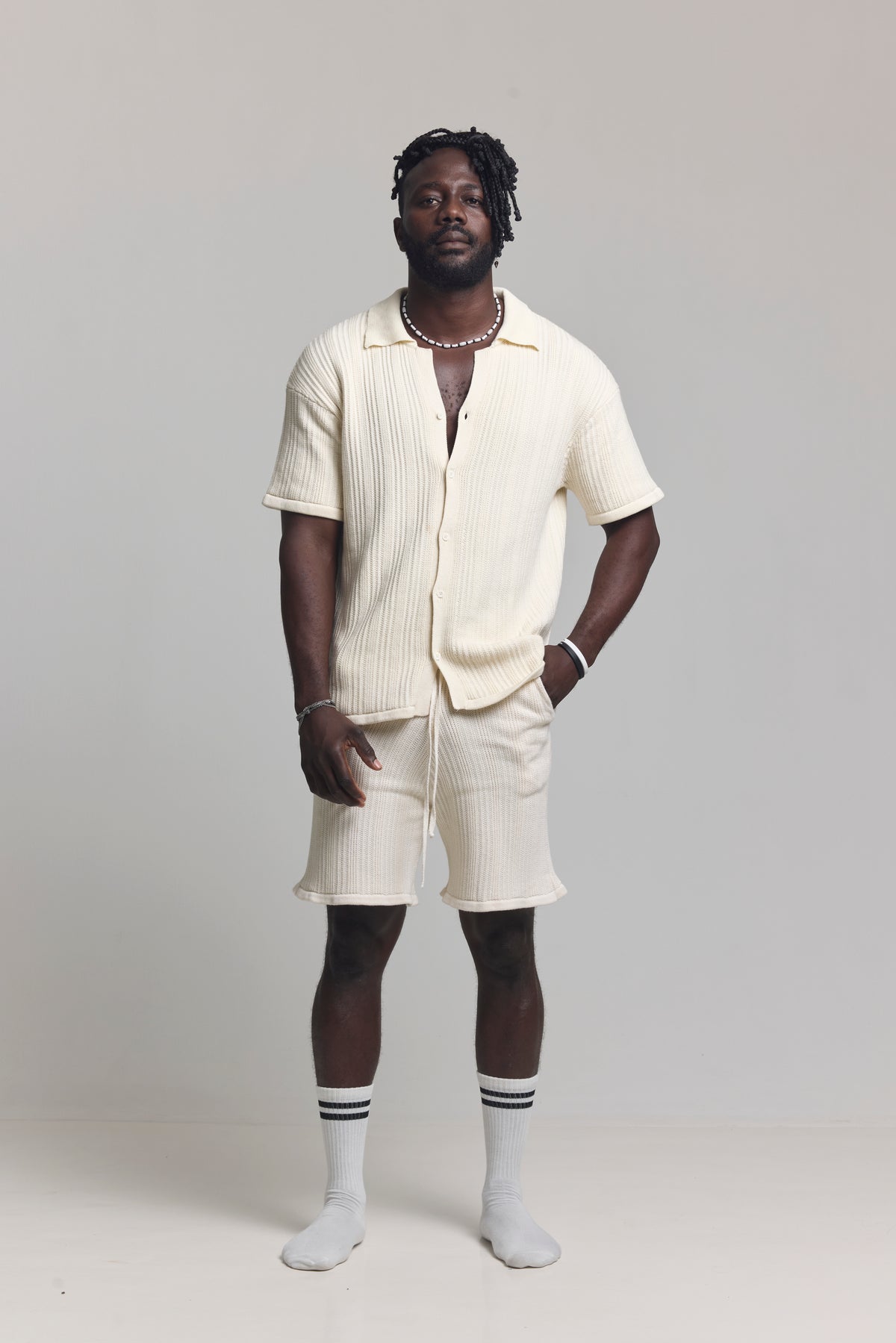 Raw Ivory Bold Cord Set, front view, styled with white socks and sneakers